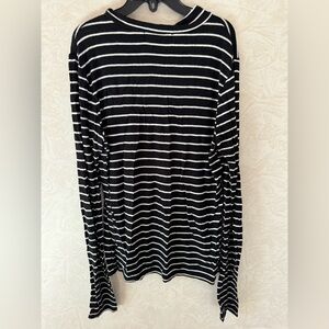 Girls Black and White Striped Long Sleeve mock turtleneck.